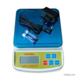 1g to 5kg AC/DC kitchen scale with stainless steel platform, AC power adapter, and AA batteries.